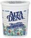 A container of yogurt with flowers on it.