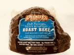 A bag of roast beef sitting on top of a table.