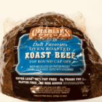 A bag of roast beef sitting on top of a table.