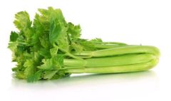 A bunch of celery is sitting on the table