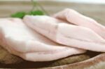 A close up of some meat on a plate