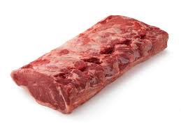 A piece of meat is sitting on the table.