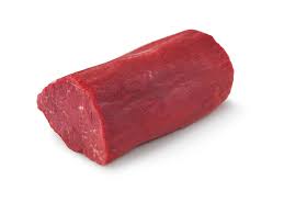 A raw meat is sitting on the table.