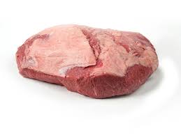 A piece of meat is sitting on the counter.